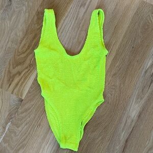 Gorgeous bond-eye neon yellow lime green one piece swimsuit. Never worn.